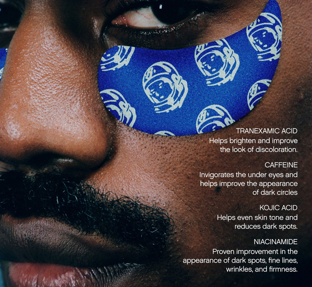 Eye patches for dark circles from Topicals shown in close-up on a model's under-eye area, with ingredient callouts for tranexamic acid, caffeine, kojic acid, and niacinamide.